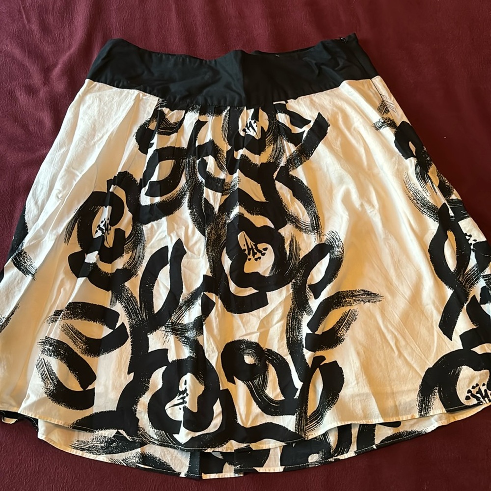 Black and white knee length skirt size 4.